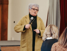 Ros speaking at an event